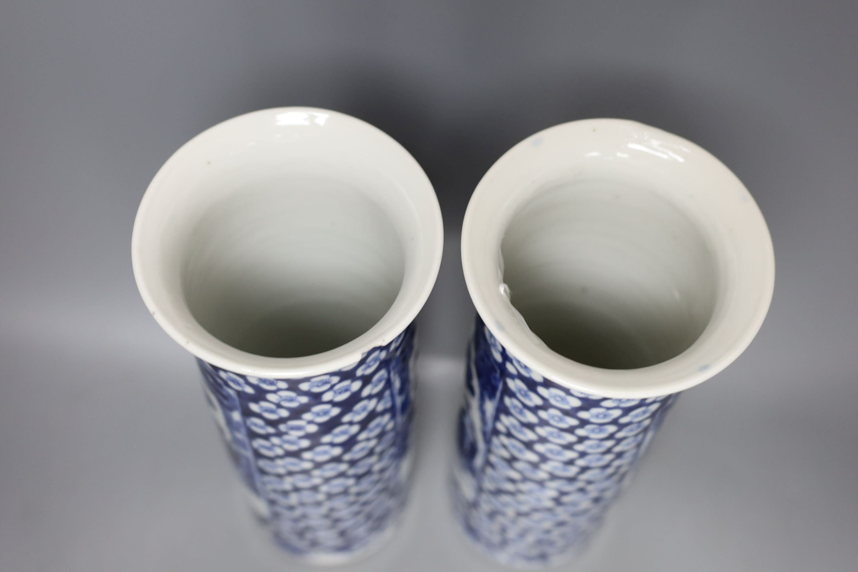 A pair of Chinese blue and white sleeve vases, late 19th century, 31cm